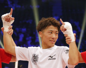 Japanese champion Naoya Inoue celebrates after defeating Ricardo Rodriguez of the U.S. in their WBO super flyweight boxing world title match in Tokyo, Sunday, May 21, 2017. Inoue knocked out Rodriguez in the third round to defend his title. (AP Photo/Toru Takahashi)