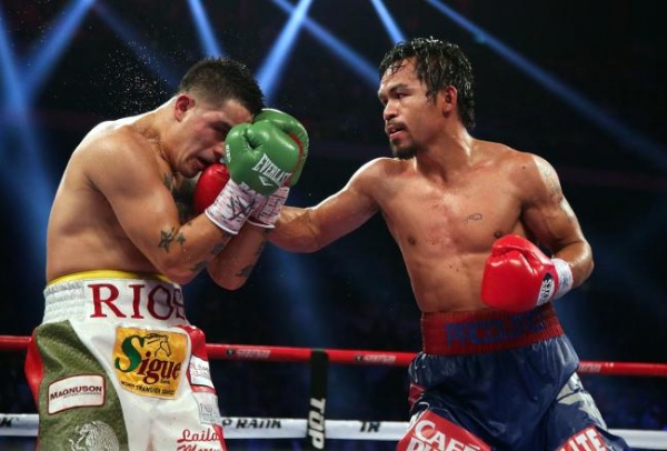 hi-res-451656295-manny-pacquiao-of-the-philippines-punches-brandon-rios_crop_north
